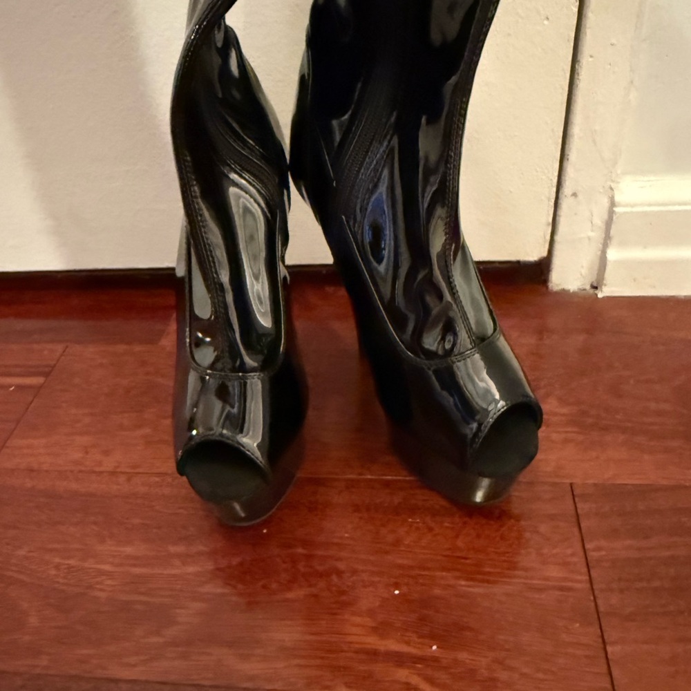 Sleek Black Patent Leather Peep-Toe Heeled Boots